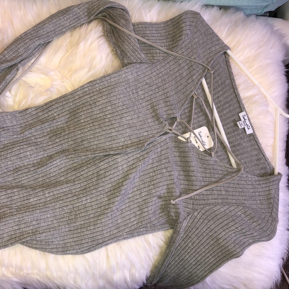 Gray bodysuit with cleavage